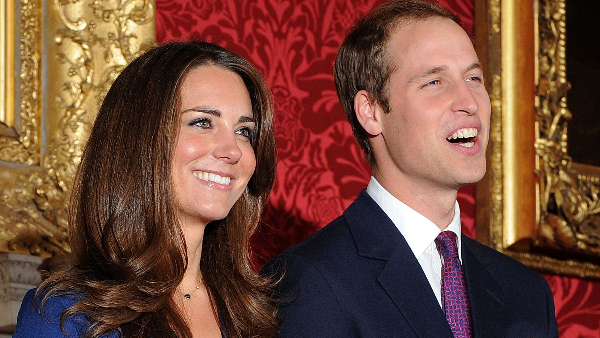 Prince William and Kate Middleton pose for photographers during a photocall to mark their engagement
