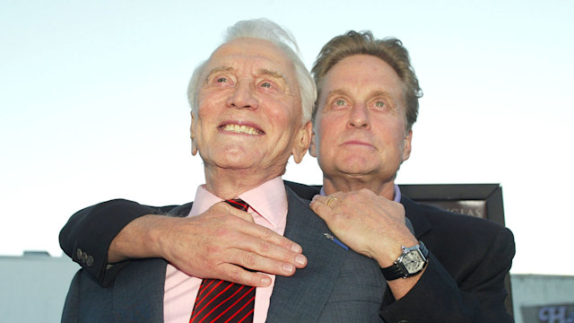 Kirk Douglas and son producer/actor Michael Douglas arrive at the premiere of "It Runs In The Family" at the Bruin Theater on April 7, 2003 in Los Angeles, California.