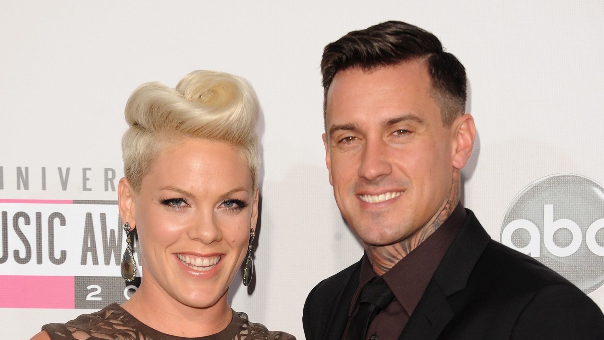 Singer Pink and athlete Carey Hart attend the 40th American Music Awards held at Nokia Theatre L.A. Live on November 18, 2012 in Los Angeles, California.