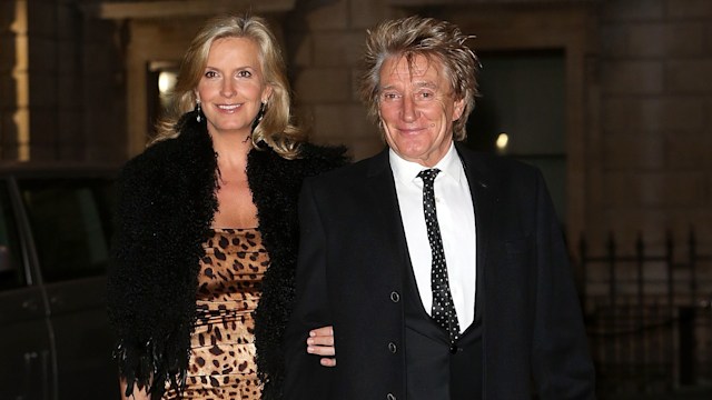 Penny Lancaster walking with Rod Stewart