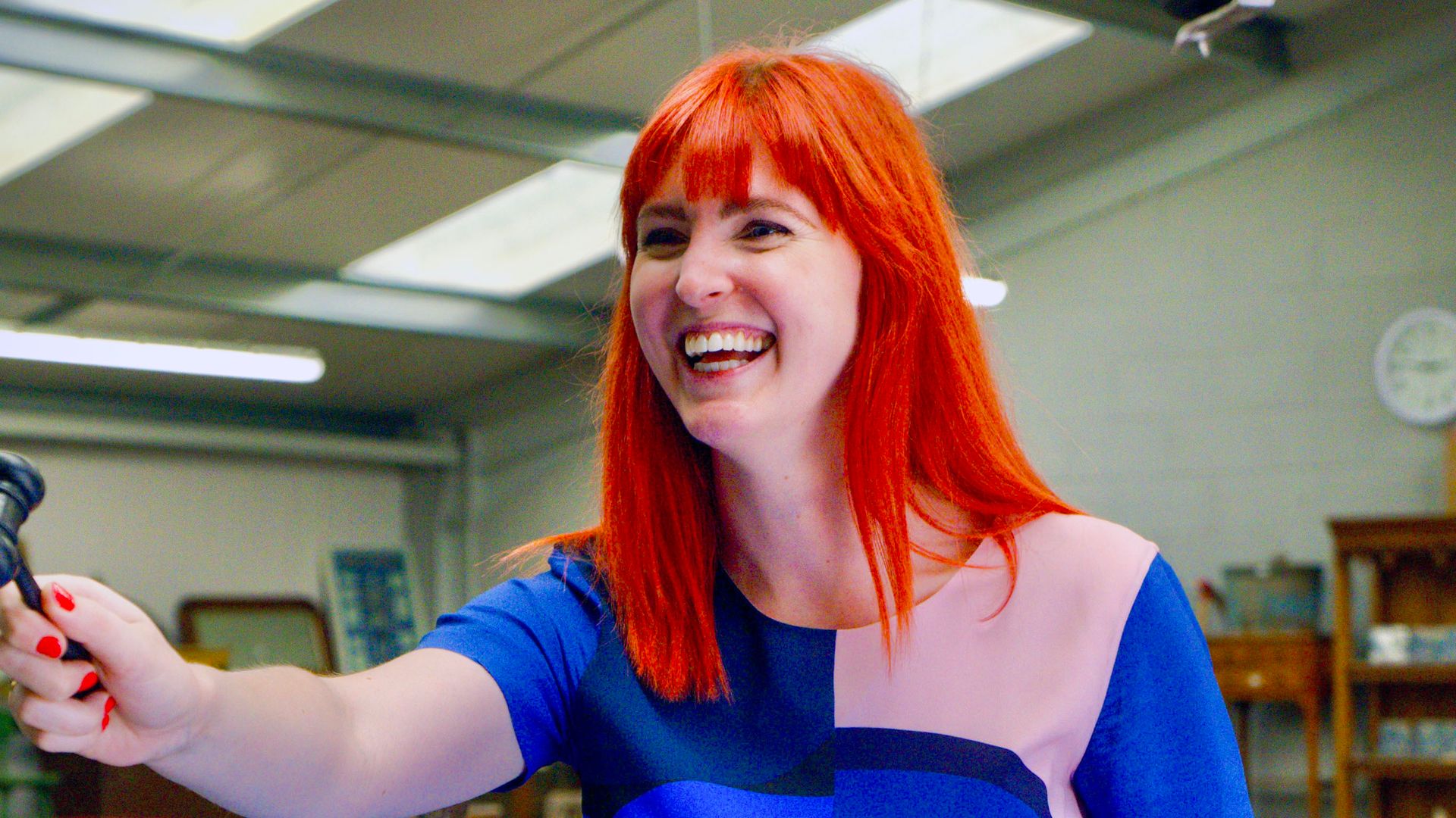 Izzie Balmer with a gavel