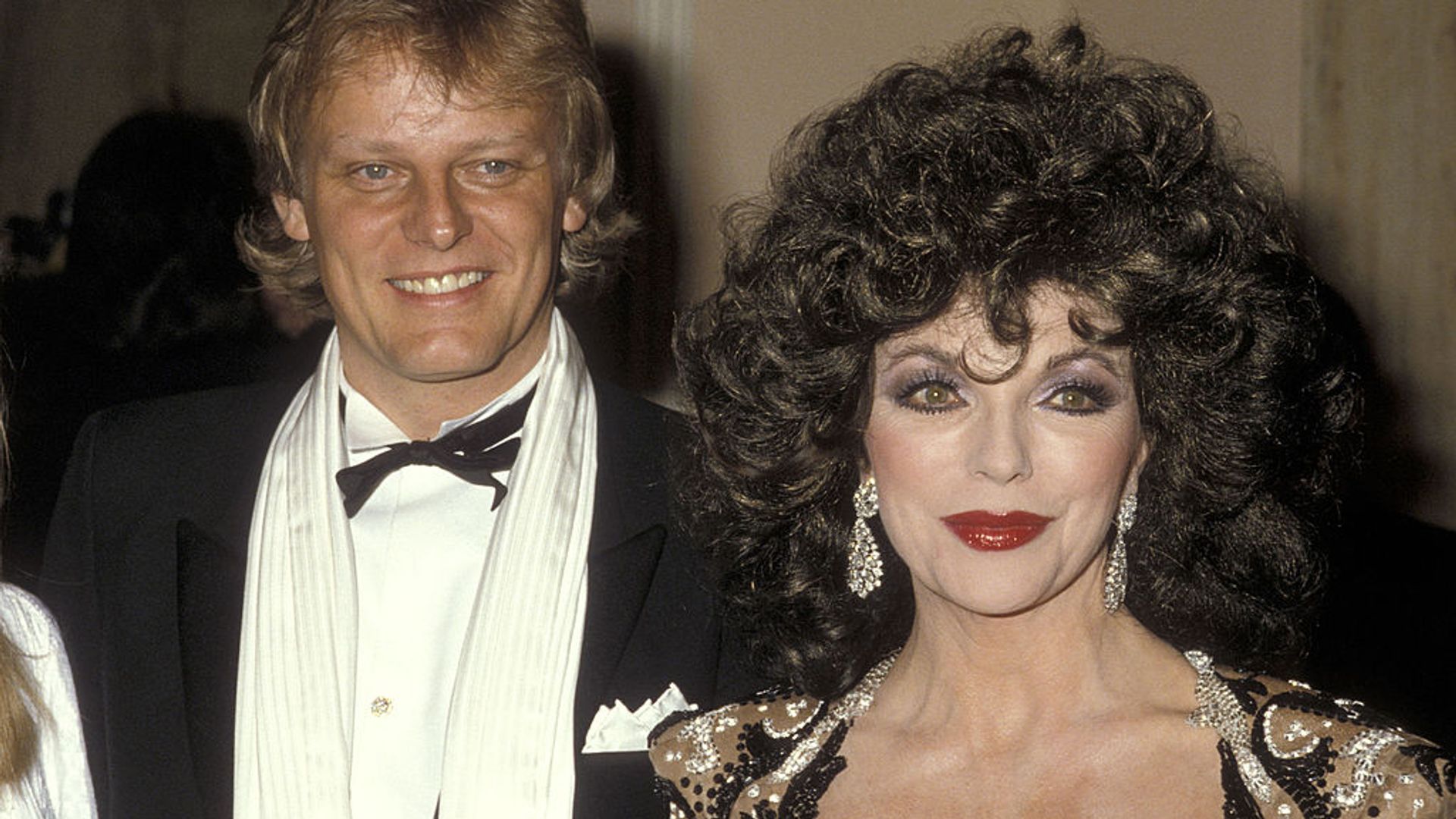 Joan Collins and Peter Holm at the Golden Globe Awards. 