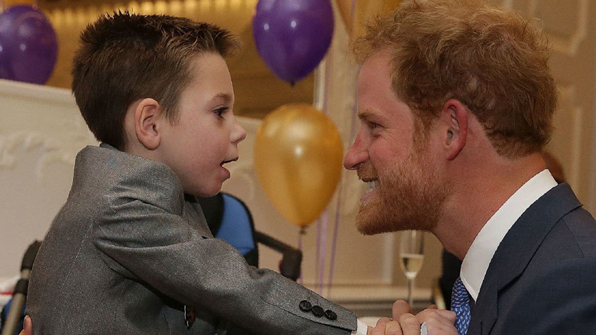 Prince Harry breaks royal protocol to hug terminally ill child, jokes ...