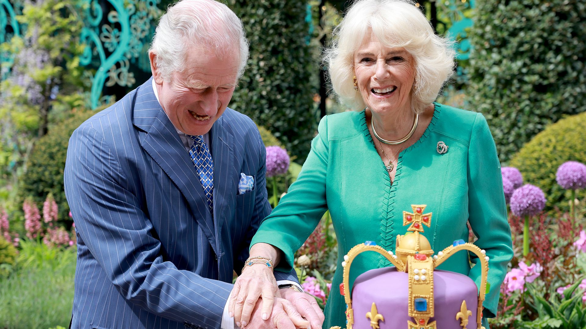 King Charles and Queen Camilla cut coronation cake
