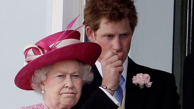Queen Elizabeth II in a pink dress and Prince Harry in a suit on Derby Day