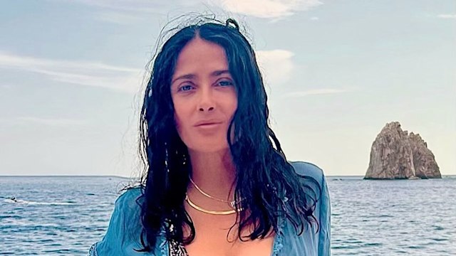 Salma Hayek poses on her yacht wearing a patterned bikini in a photo shared on Instagram