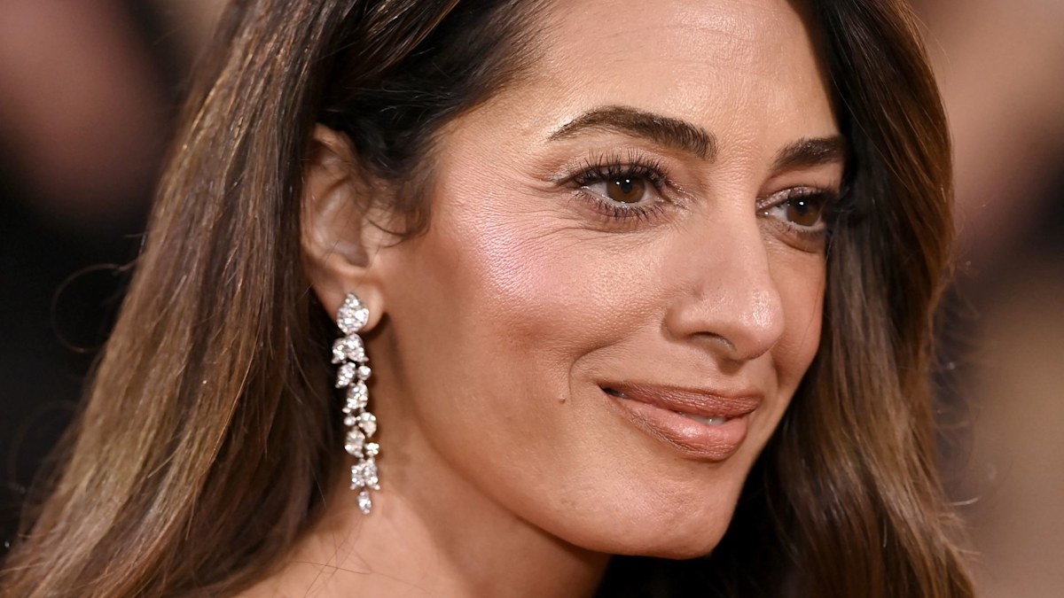 Amal Clooney is a 70s bombshell in flared jeans