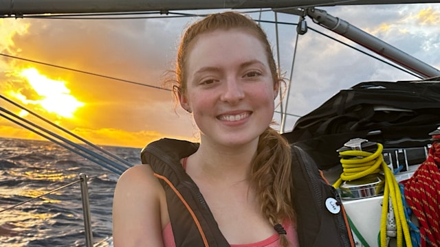 Young woman on sailing boat