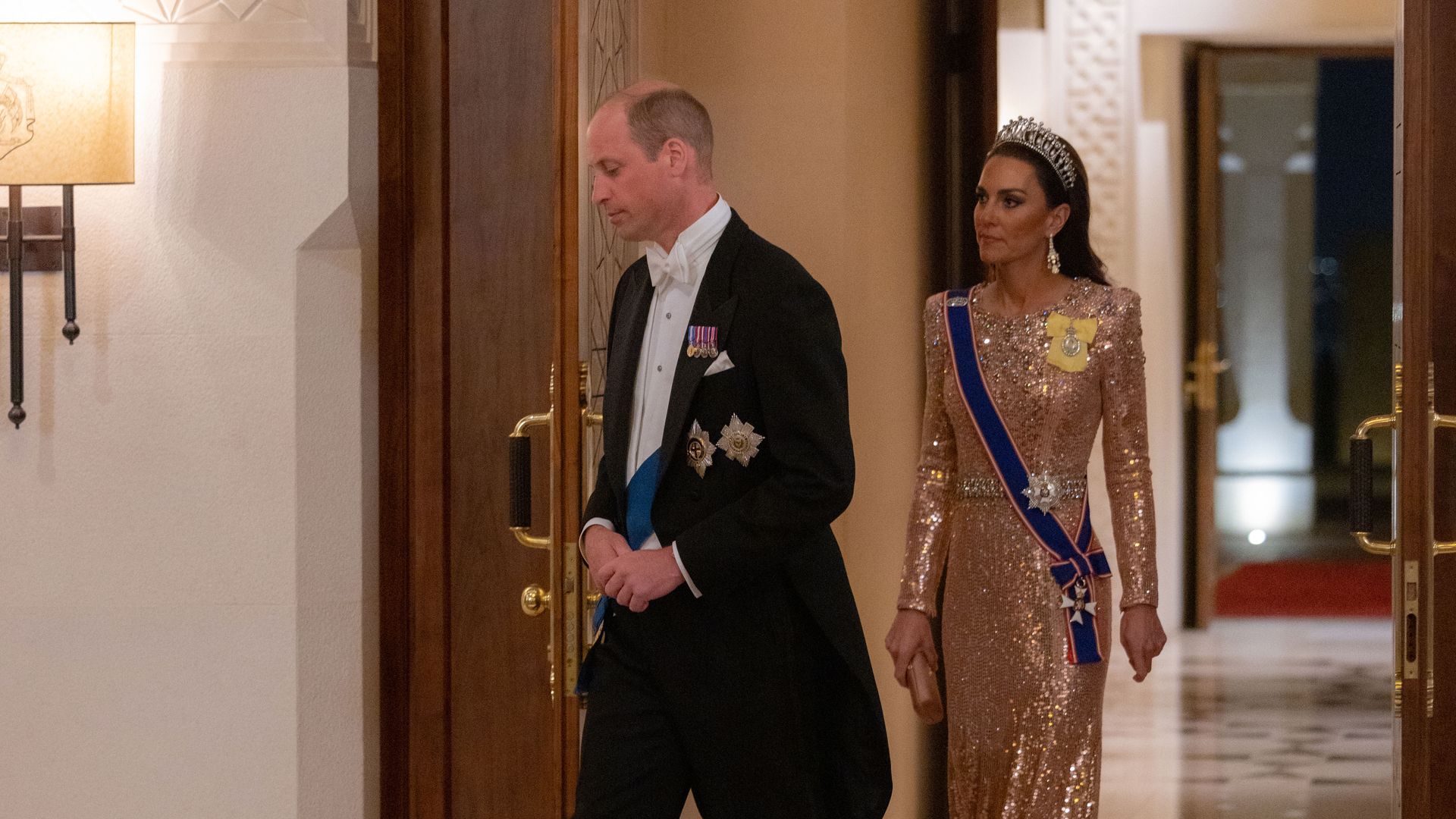 The Prince and Princess of Wales arriving at a state banquet