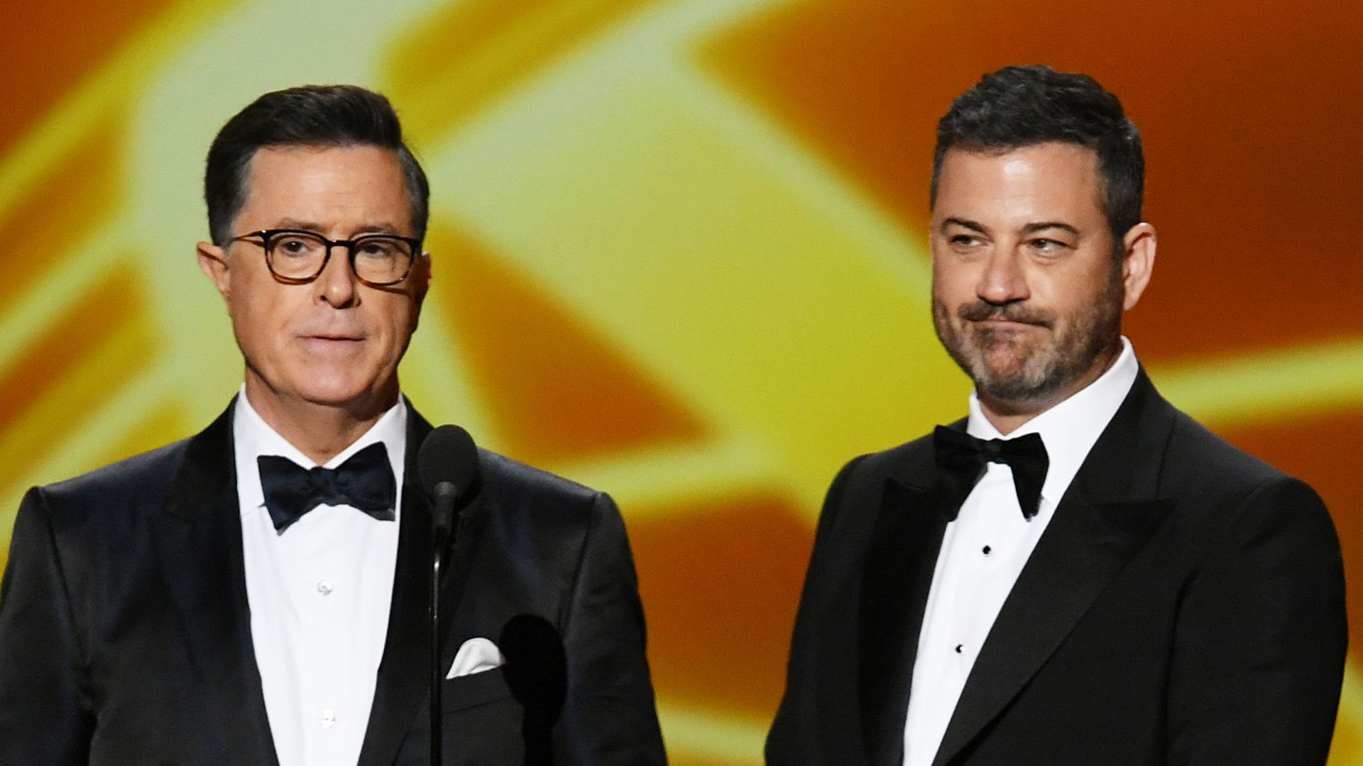 Stephen Colbert and Jimmy Kimmel onstage during the 71st Emmy Awards