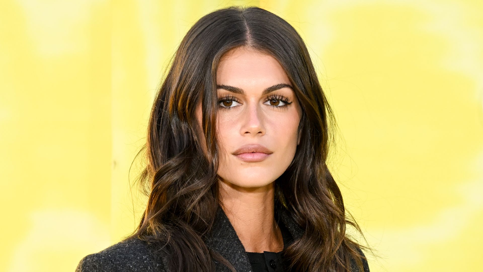 Kaia Gerber is Cindy Crawford's double in thigh-high stockings and Victoria Beckham blazer
