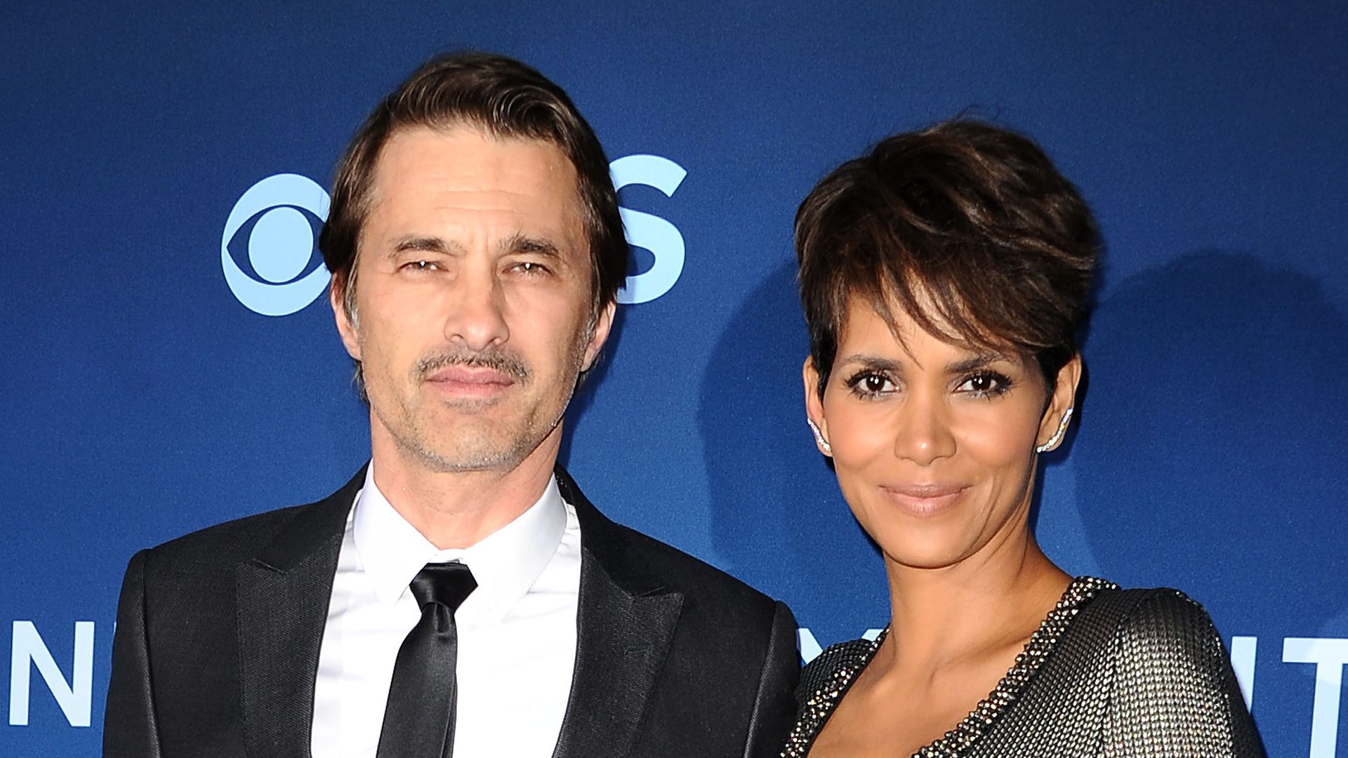 Olivier Martinez and Halle Berry attend the premiere of "Extant" on June 16, 2014 in Los Angeles