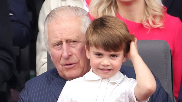 Prince Louis sat on King Charles' lap
