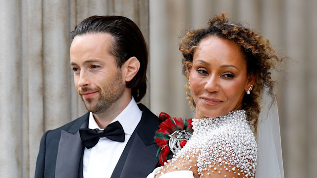 Rory McPhee and Mel B in wedding outfits shoulders up