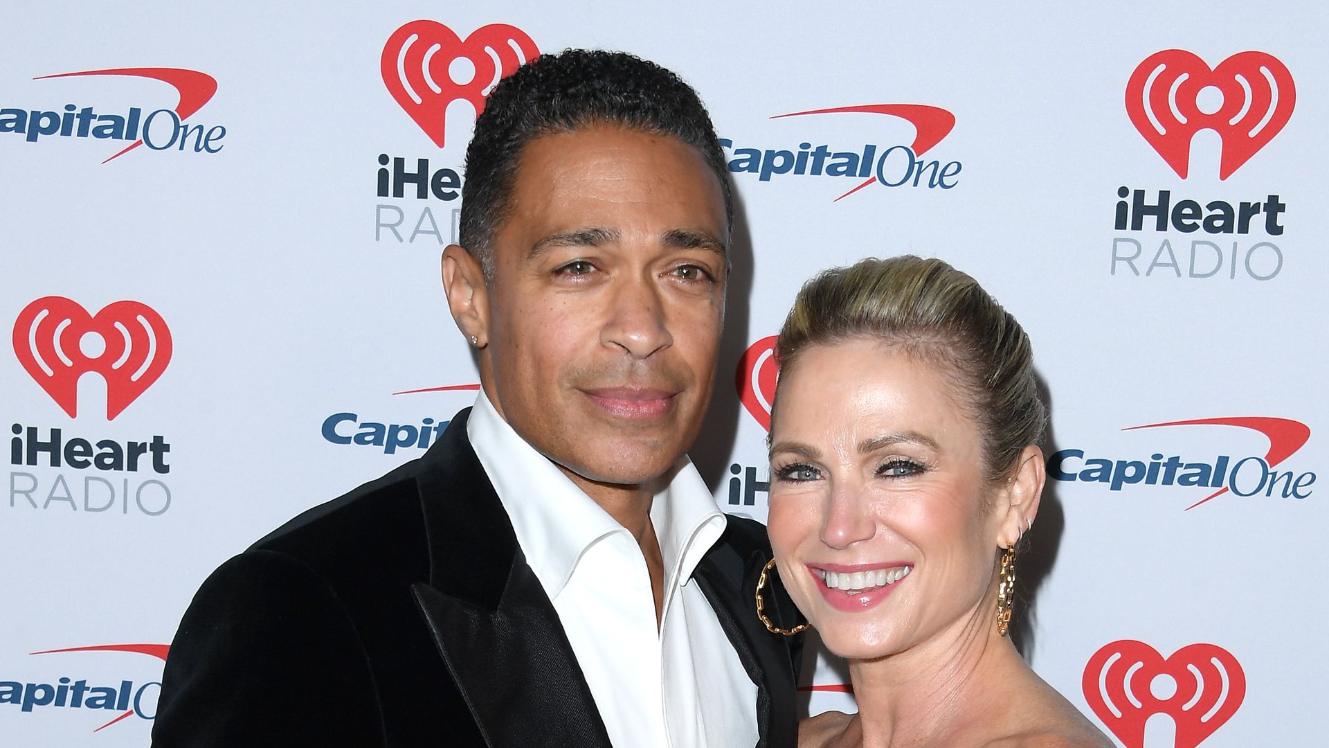 Amy Robach and T.J. Holmes have reason to celebrate as they raise a glass to their future