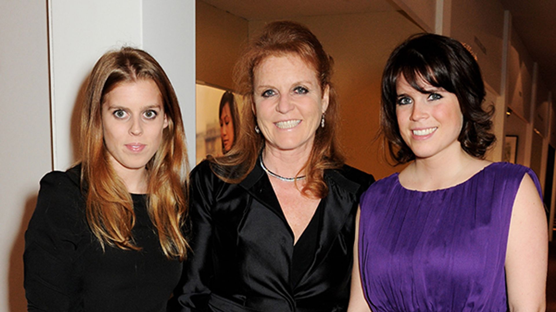 Sarah Ferguson stands close with both of her daughters Princess Beatrice and Princess Eugenie