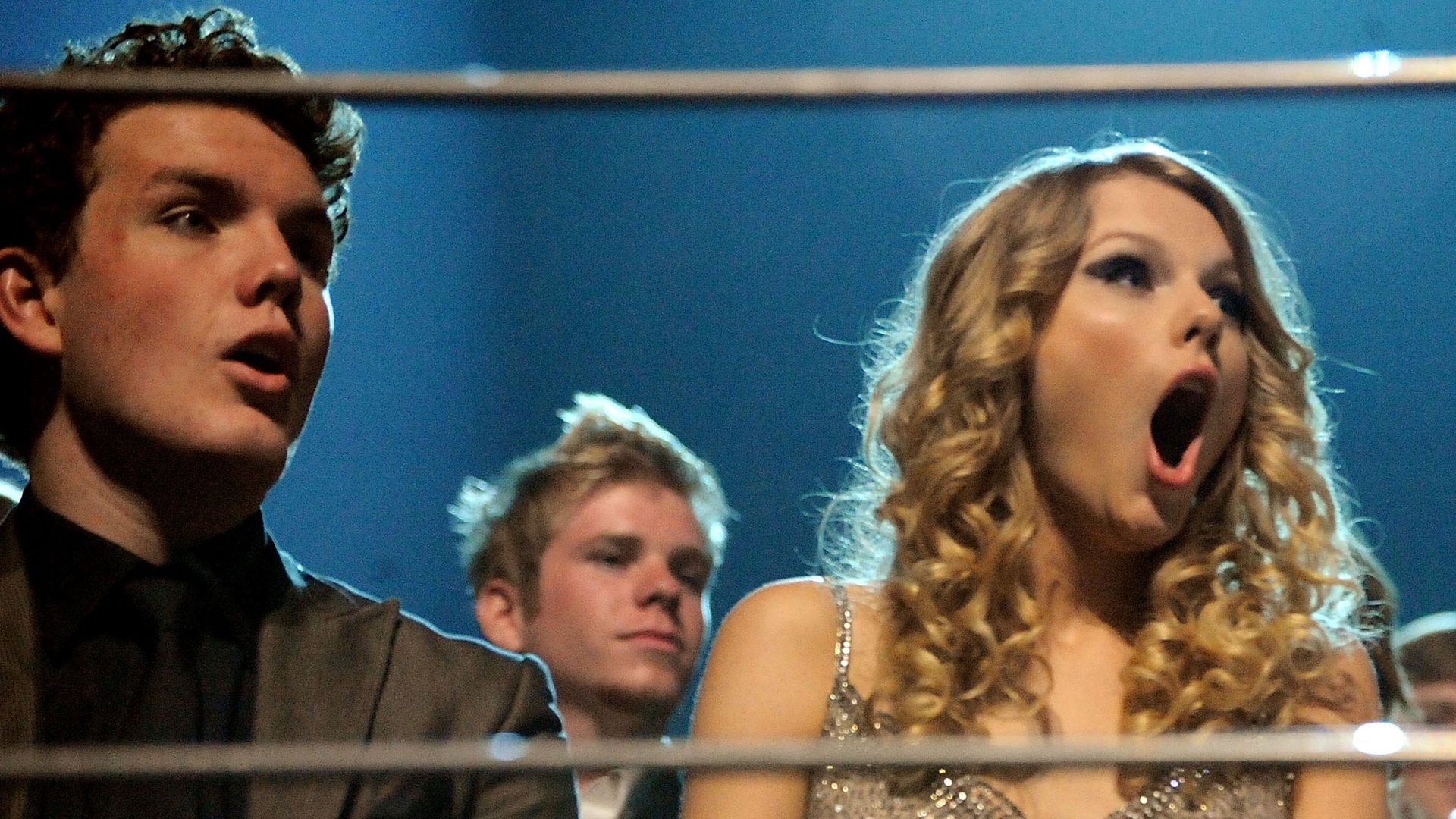 Taylor and Austin sat, mouths open in shock