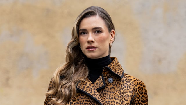  Zita d'Hauteville wears leopard print coat, black bag, boots outside Dior during Womenswear Spring/Summer 2025 as part of  Paris Fashion Week on September 24, 2024 in Paris, France. 