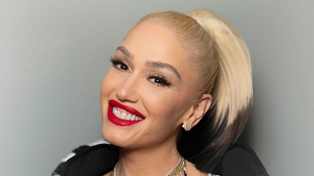 Gwen Stefani smiling red lipstick