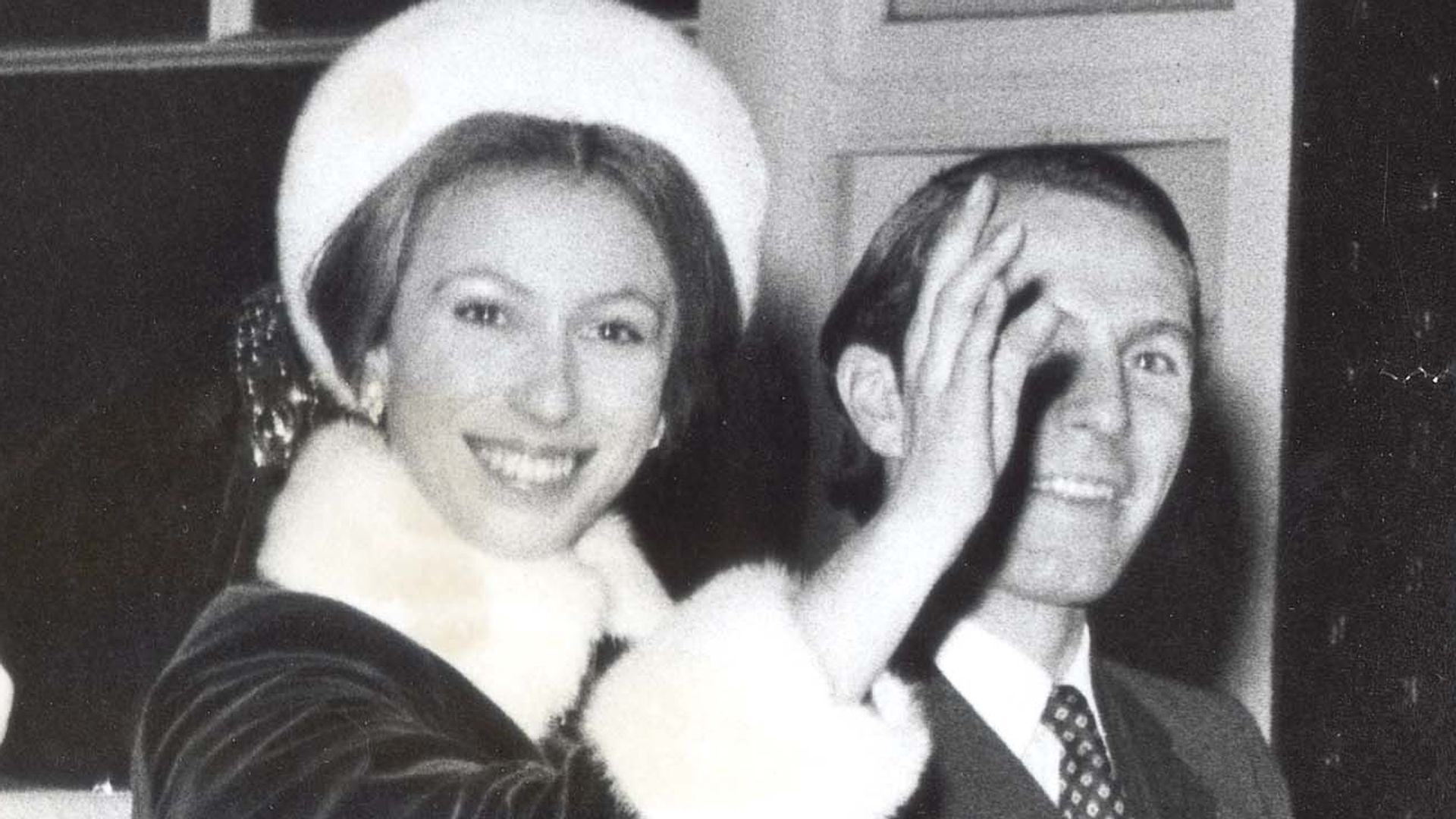 Princess Anne waving to crowds as she left for her honeymoon with Mark Phillips