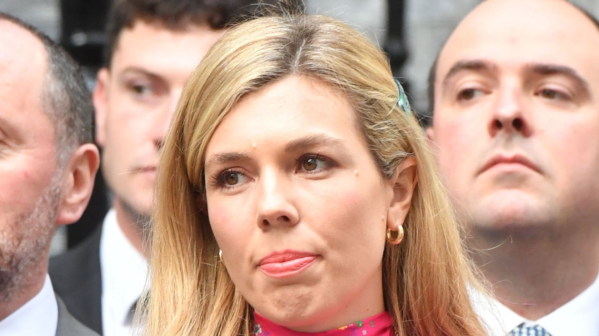 Carrie Johnson wearing a pink dress