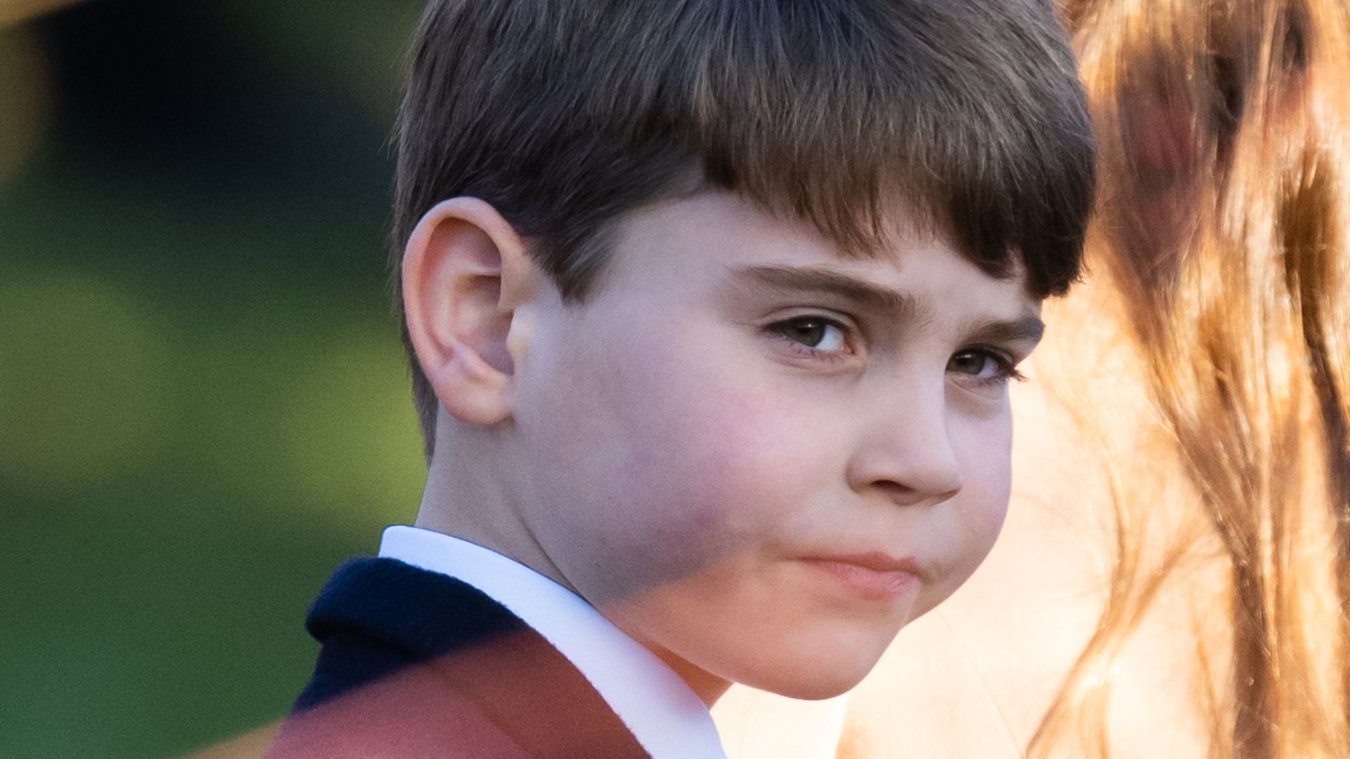 Prince Louis snatches Christmas present from Prince William in hilarious moment - watch