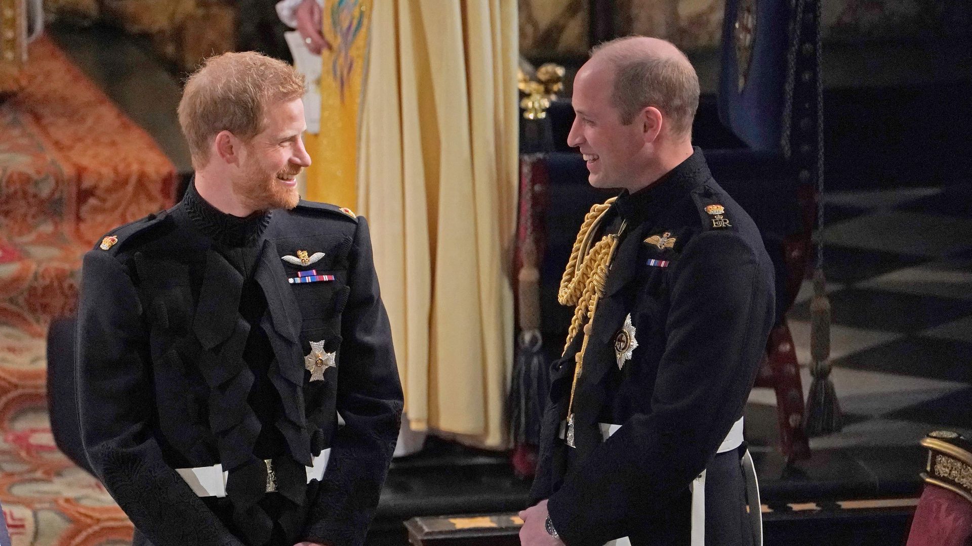Prince Harry and Prince William laughing at Harry's wedding