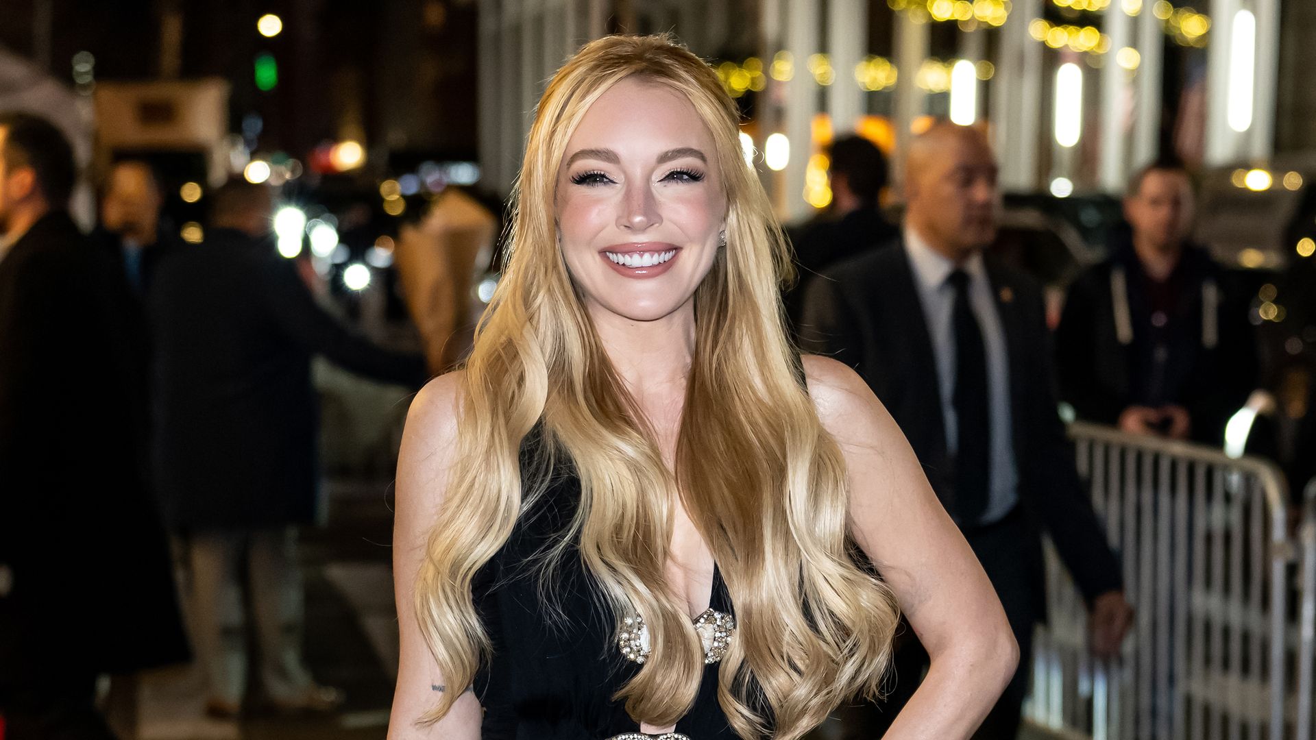 Lindsay Lohan is seen arriving to the screening of Netflix's "Our Little Secret" at The Paris Theatre on November 18, 2024 in New York City