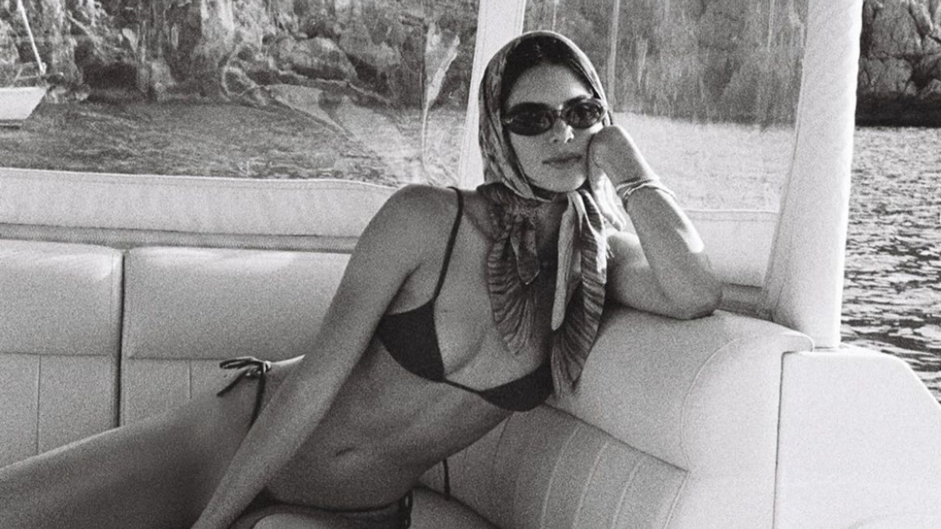 While enjoying a girls' trip in Mallorca, Spain, with her younger sister Kylie, Kendall Jenner showcased the true versatility of a headscarf.