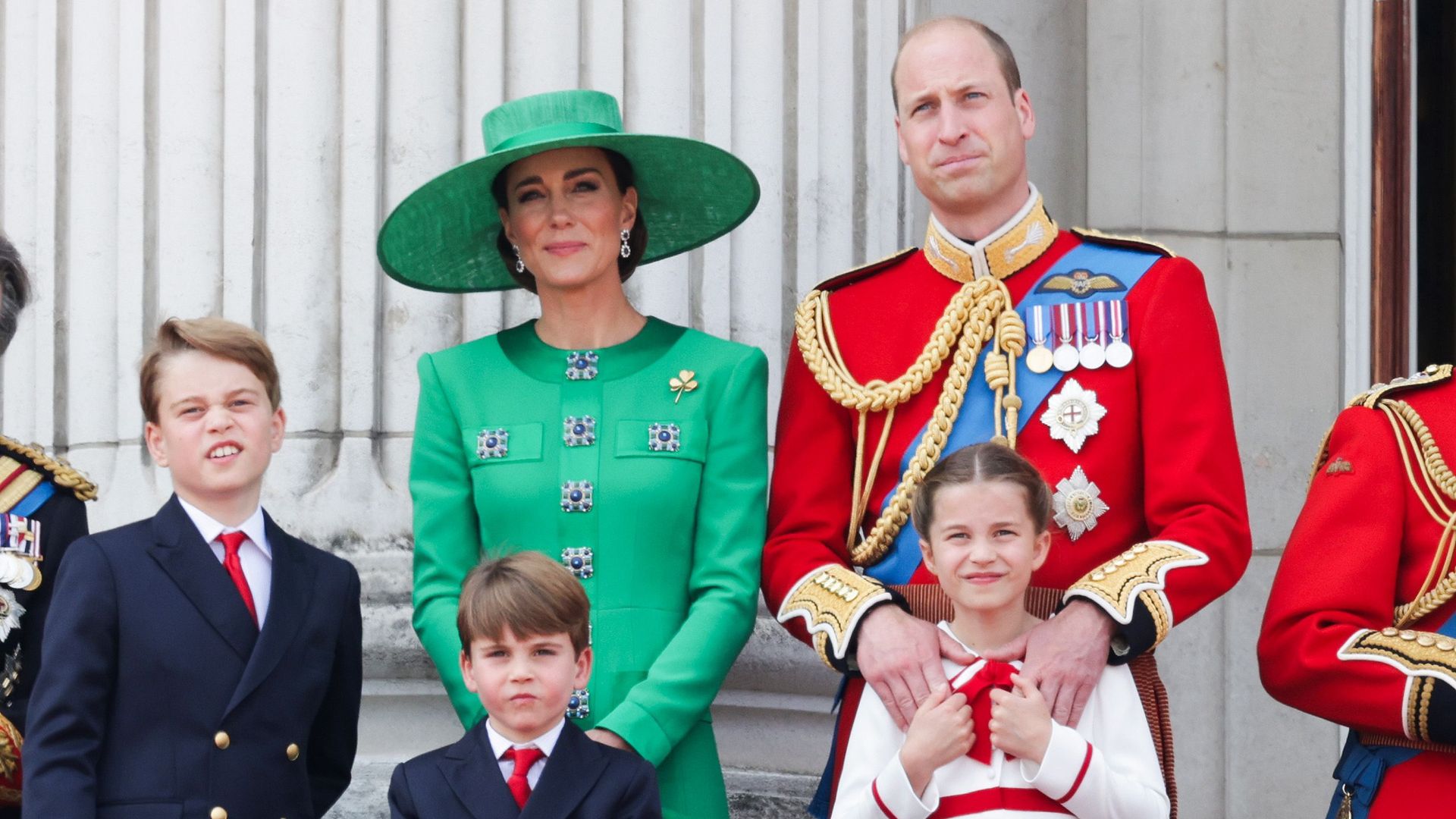 Prince William holds Princess Charlotte at Trooping the Colour