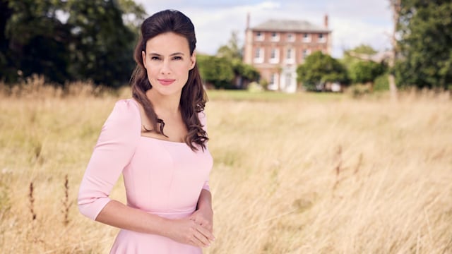 Sanditon star Sophie Winkleman poses in a pink dress