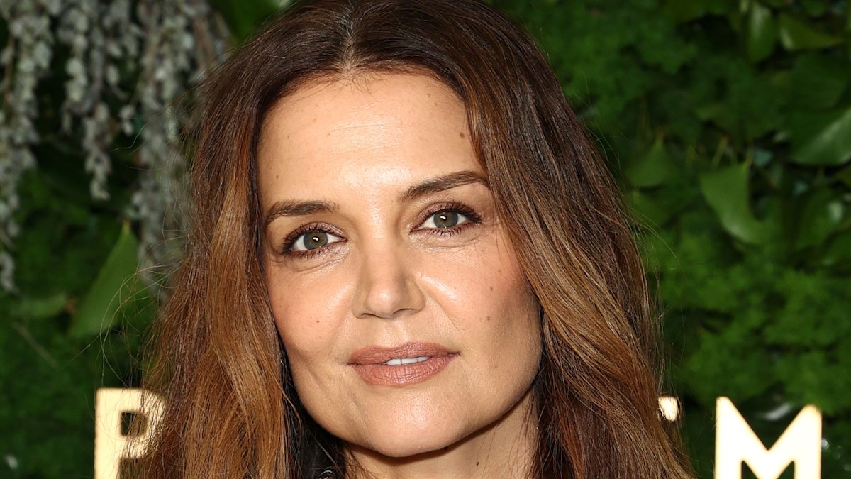 Katie Holmes steals the show with slick hair updo and semi-sheer top during NYC outing