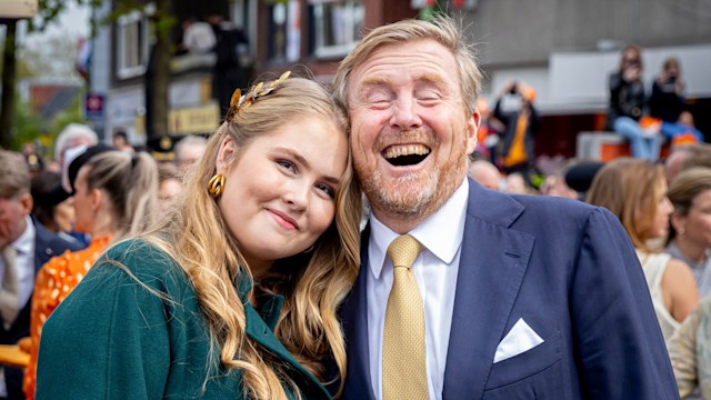 Crown Princess Catharina-Amalia resting her head on Willem-Alexander's shoulder