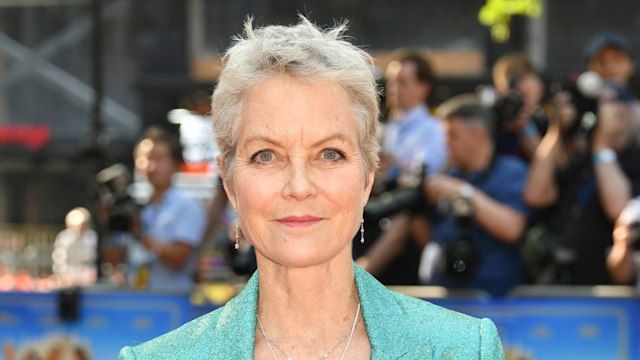 Jenny Seagrove posed in sparkly teal suit