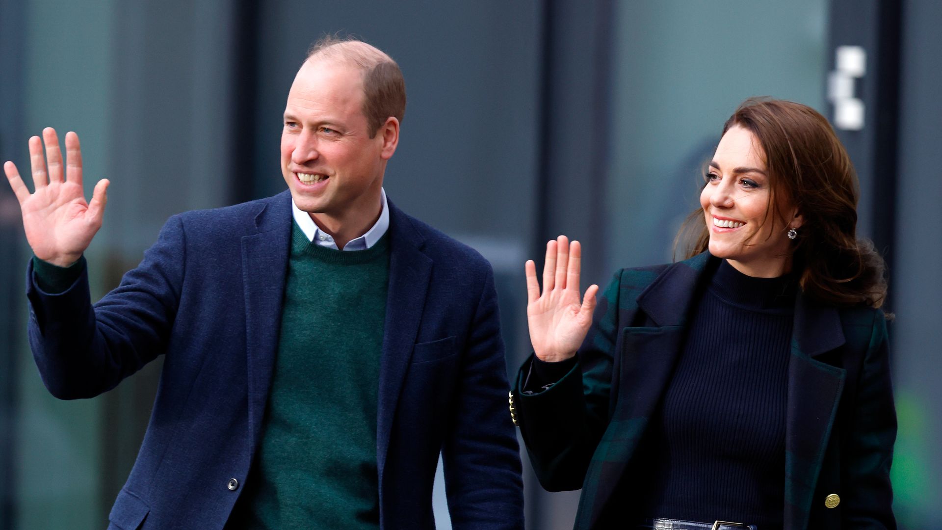 William and Kate wave as they arrive in Merseyside