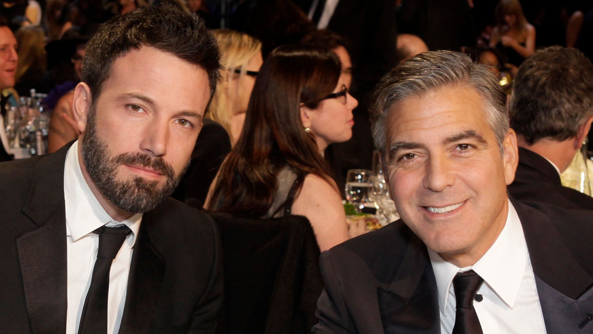 Director Ben Affleck and producer Geroge Clooney attend the Critics' Choice Movie Awards 2013 with Champagne Nicolas Feuillatte at Barkar Hangar on January 10, 2013 in Santa Monica, California.