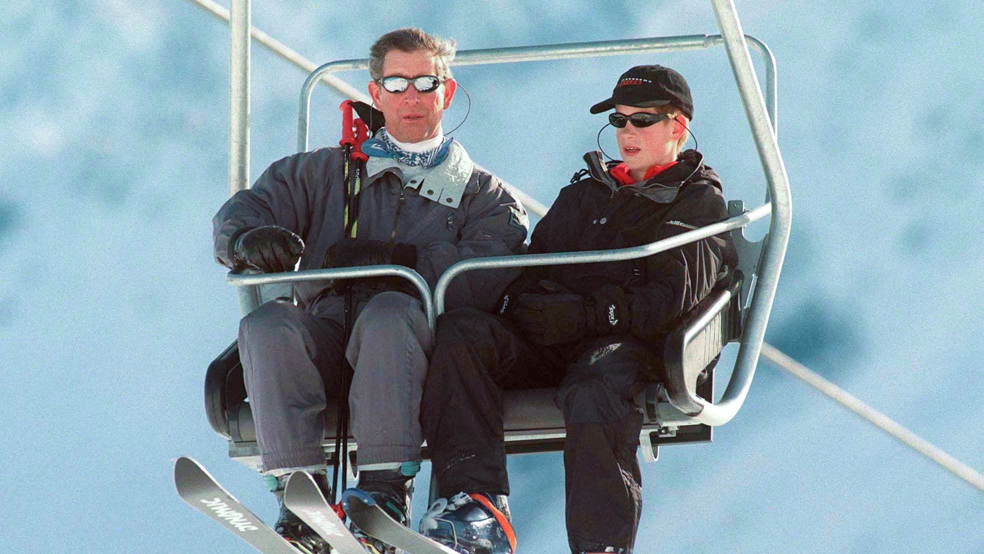King Charles and Prince Harry on a ski lift