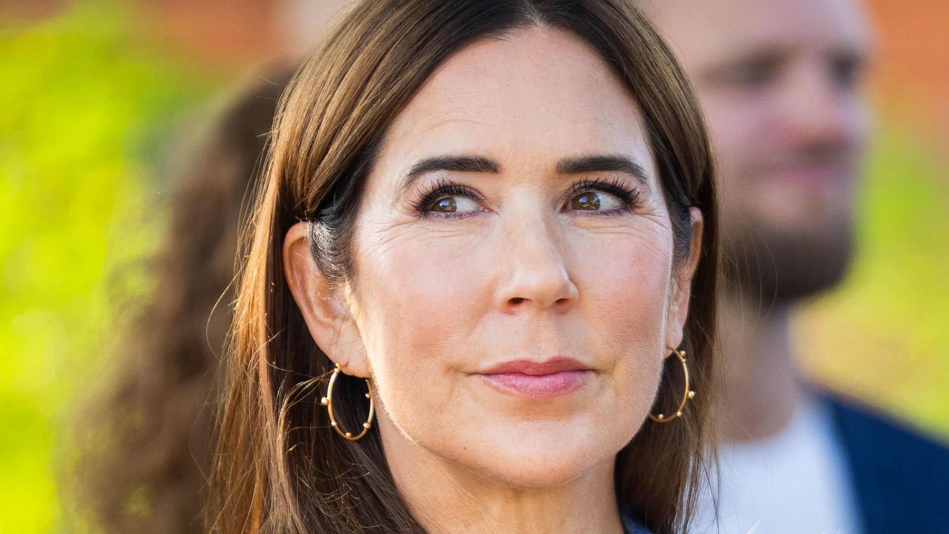 Queen Mary looking to right in blue striped blazer