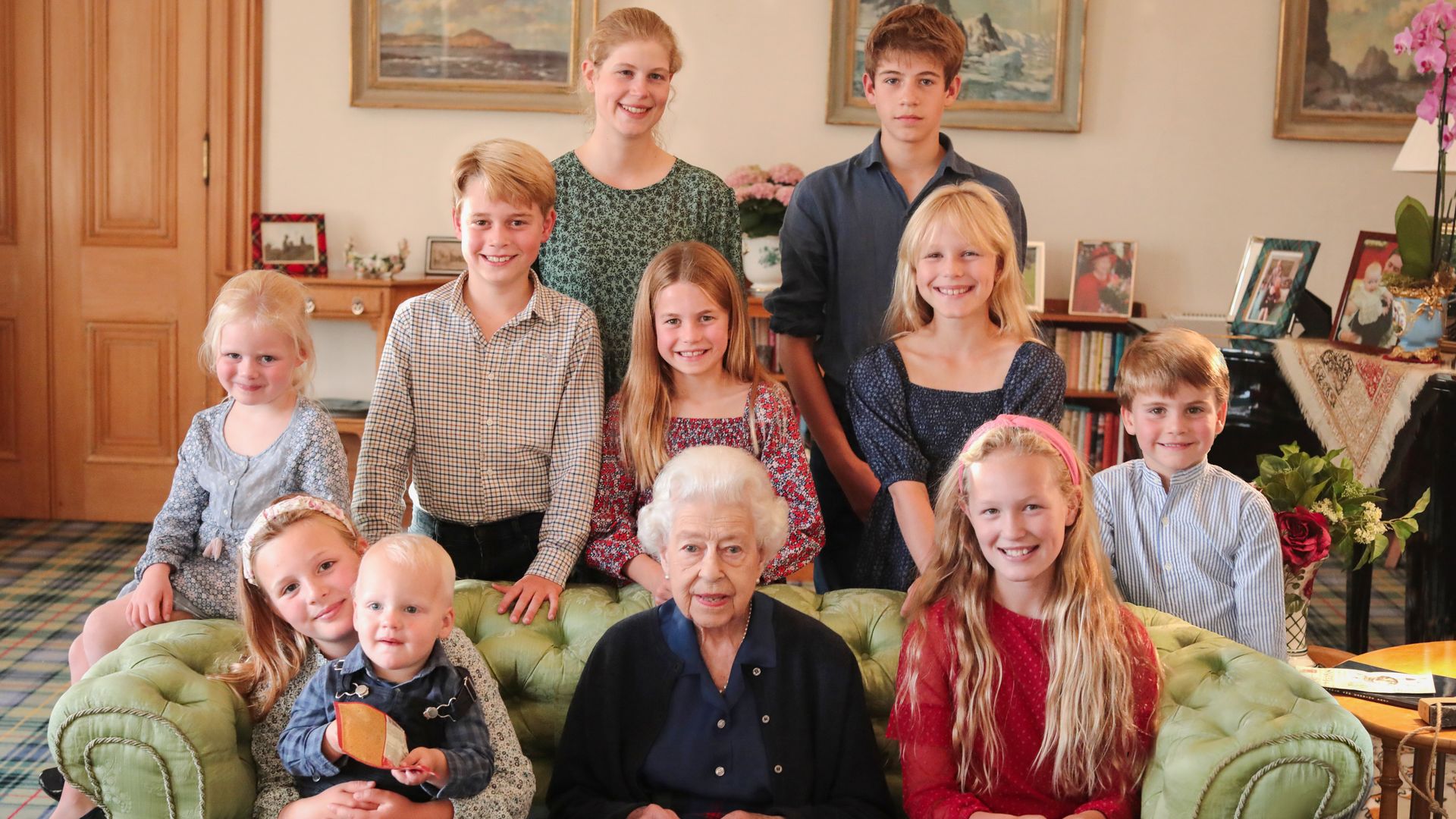 The late Queen pictured with some of her grandchildren and great-grandchildren at Balmoral