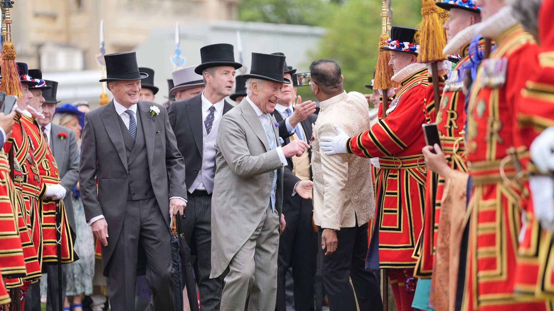 King Charles speaking to beefeaters