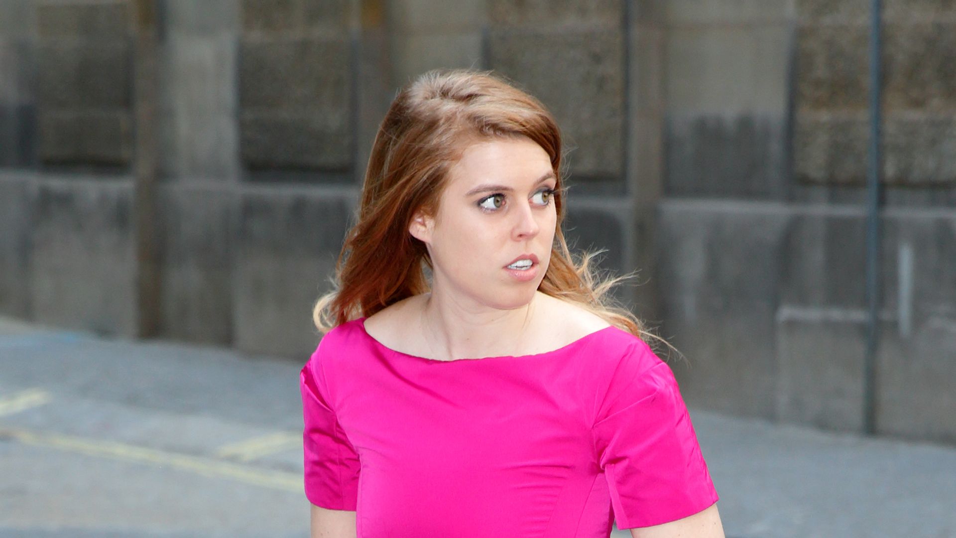 Cheeky Princess Beatrice almost throws a glove off Buckingham Palace balcony in rare unearthed video