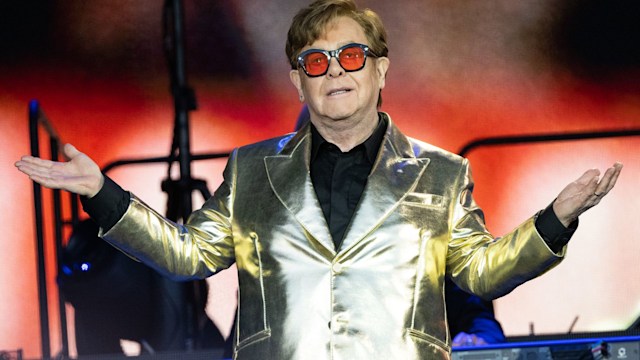 Sir Elton John looks out over the audience as performs on The Pyramid Stage at Day 5 of Glastonbury Festival 2023 on June 25, 2023 in Glastonbury, England