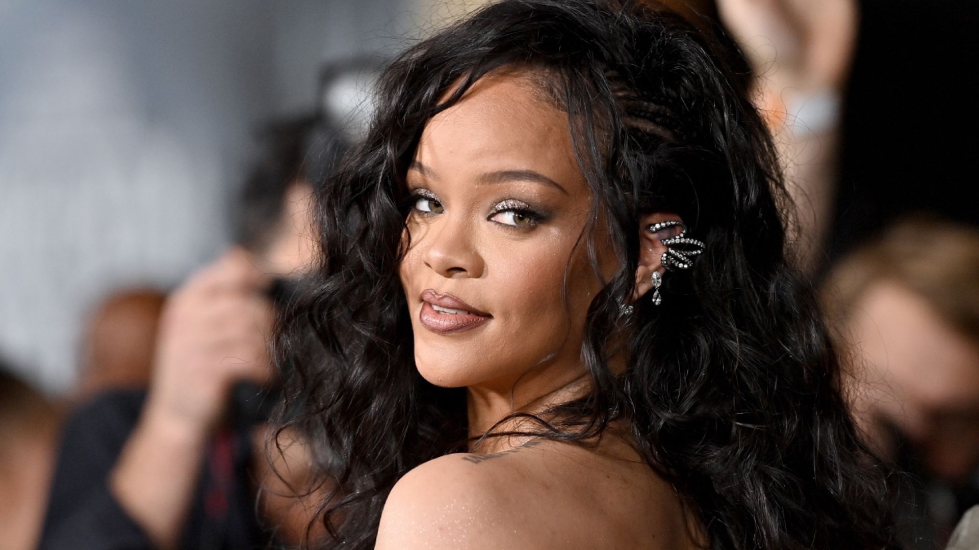 Rihanna nearly breaks the internet in strappy lingerie for a