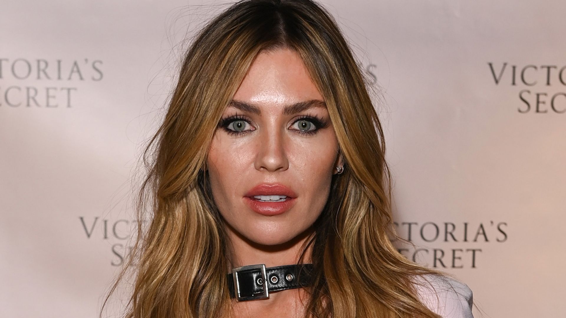 Abbey Clancy showcases her cleavage and svelte abs for launch of new Victoria's  Secret UK collection