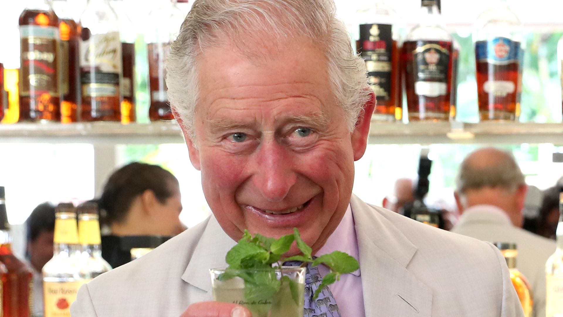 King Charles drinking a mojito garnished with mint during Cuba visit 