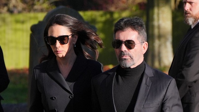 Simon Cowell and Lauren Silverman look downcast