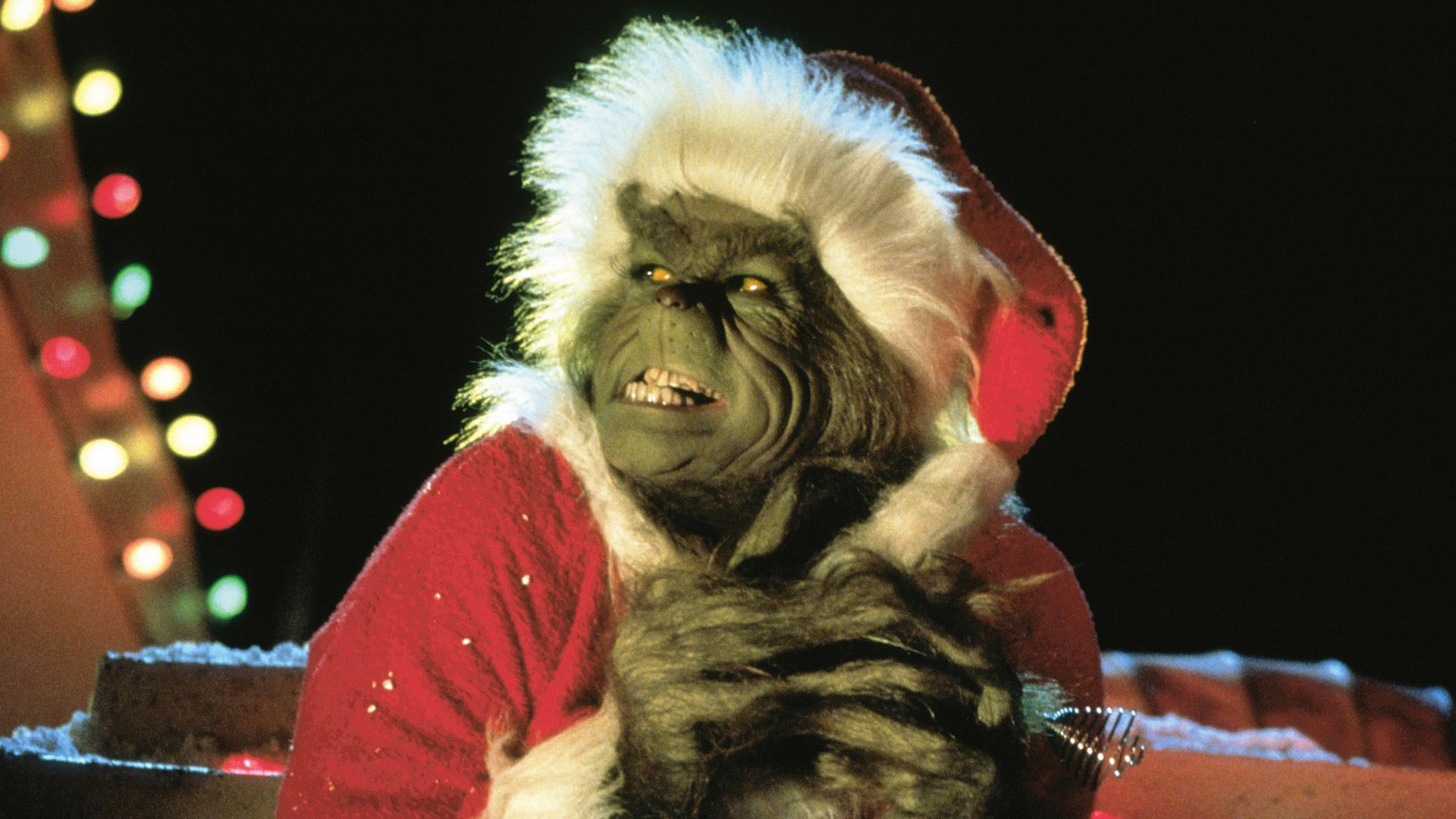 Jim Carrey as The Grinch