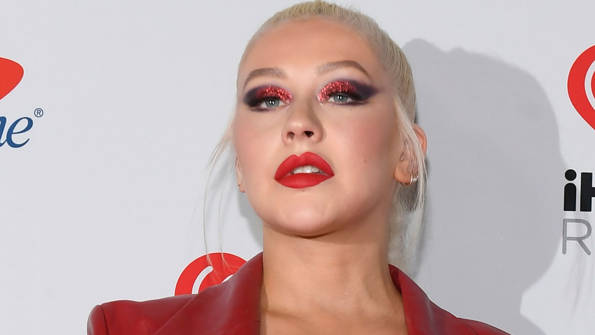 Christina Aguilera in red leather outfit