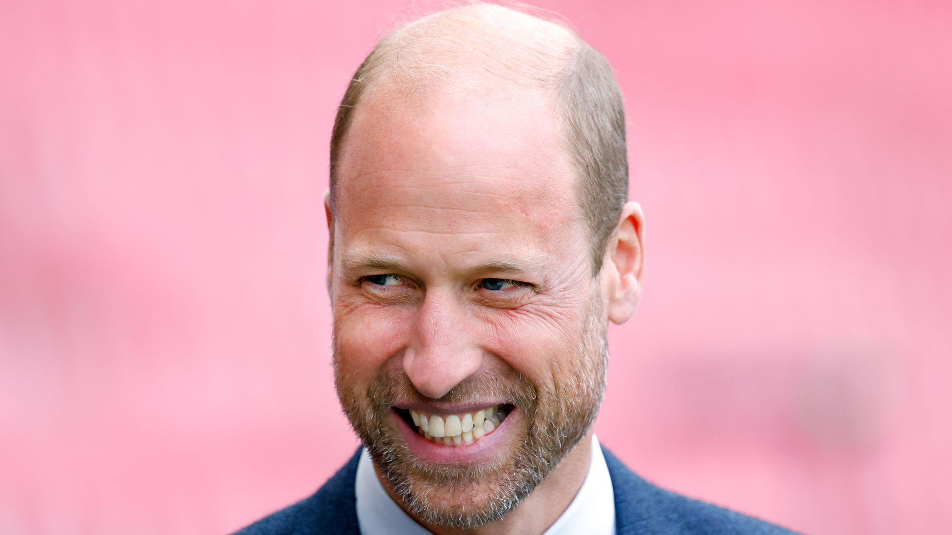 prince william in suit smiling