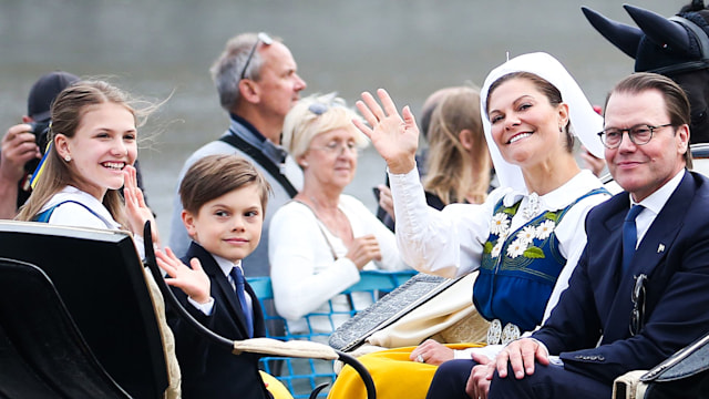 Swedish royals riding in carriage